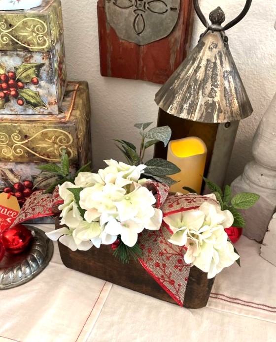 3 hole sugar mold with white hydrangea in a Christmas vignette