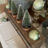 vintage ornaments and small trees in a 6 hole sugar mold