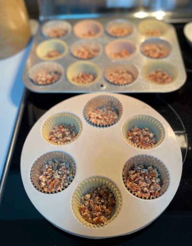 pecan crust filled cupcake liners ready to fill