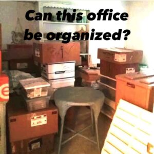 room filled with cardboard boxes and furniture, waiting to be organized