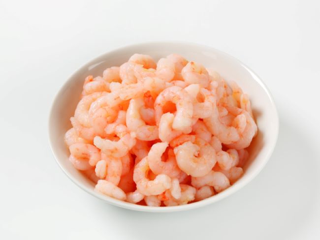 white bowl full of small shrimp