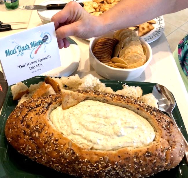rustic artisan bread filled with dill spinach dip