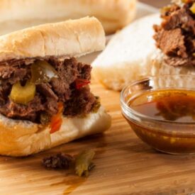 Italian Beef Sandwich on crusty bread, served with a cup of au jus