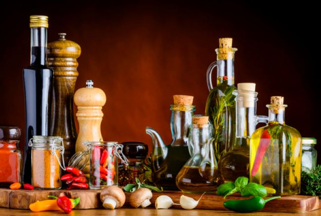 bottles of oil, vinegar & spices
