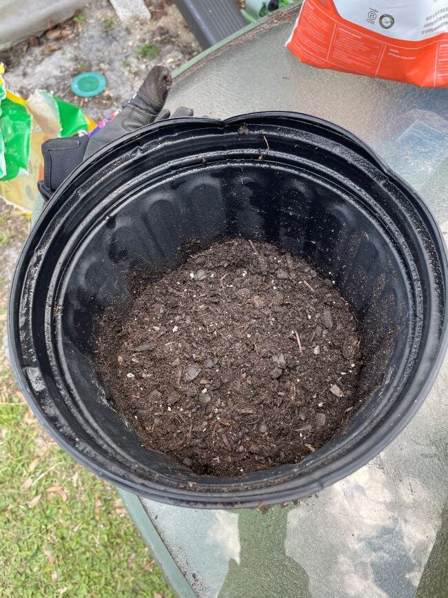 potting mix added to a grower's pot