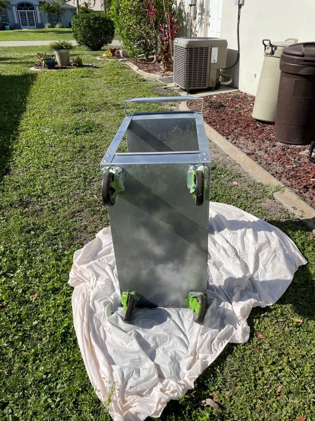 Industrial Cart After Spray Paint In Yard Rotated 