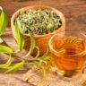 glass cup filled with lemon verbena infusion