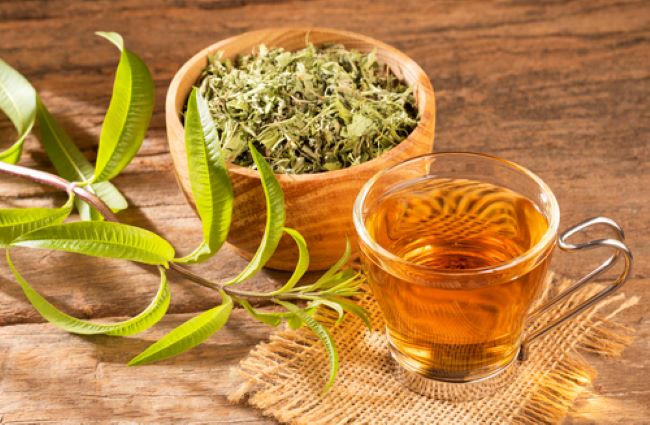 glass cup filled with lemon verbena infusion