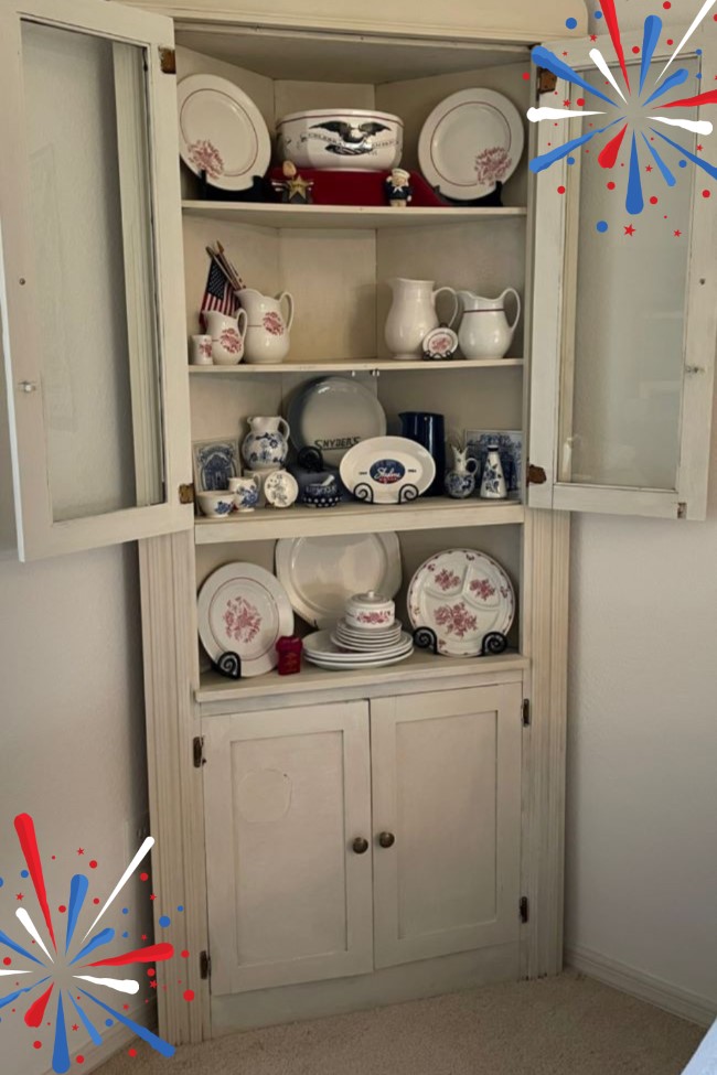chalk painted corner hutch decorated with restaurant china & blue delft