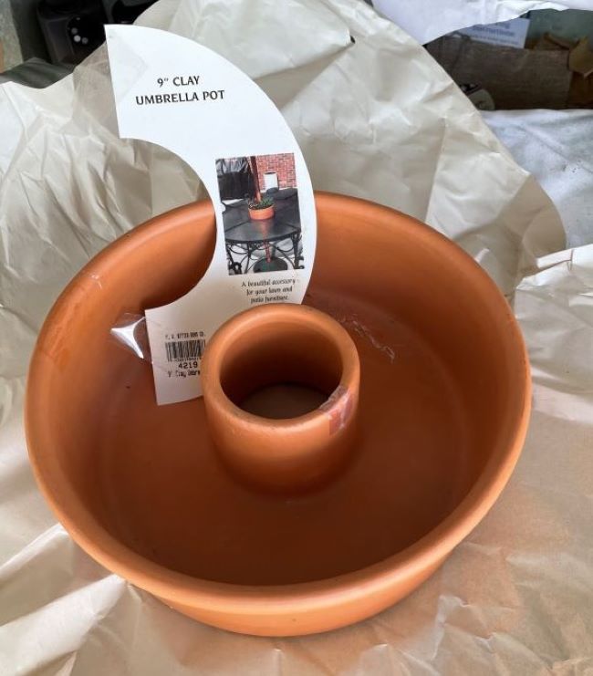 9" clay pot designed to fit around a patio umbrella