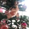 tiny pink satin baby shoes used as a Christmas tree decoration