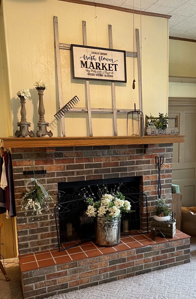 farmhouse fireplace mantel decorated for Spring - Brocante Style