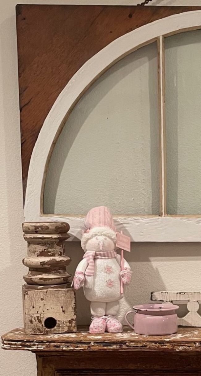 Snowman dressed in pink hat with a Shabby Christmas sign