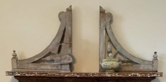 architectural salvage corbels on mantel
