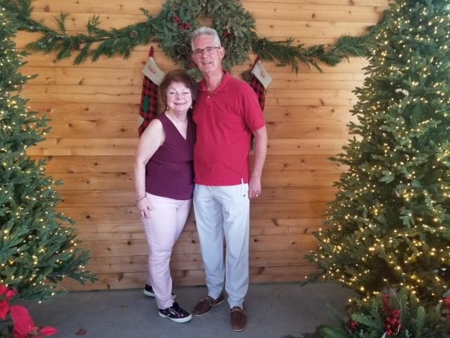 couple posed for a holiday photo