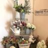 vintage style corner wire rack filled with buckets of faux flowers