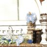 reclaimed fireplace mantel with architectural salvage pieces, heritage bibles, faux florals and soft fabric pumpkins