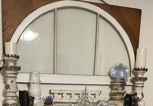 architectural salvage pieces accent an early fall mantel with blue & white pumpkins