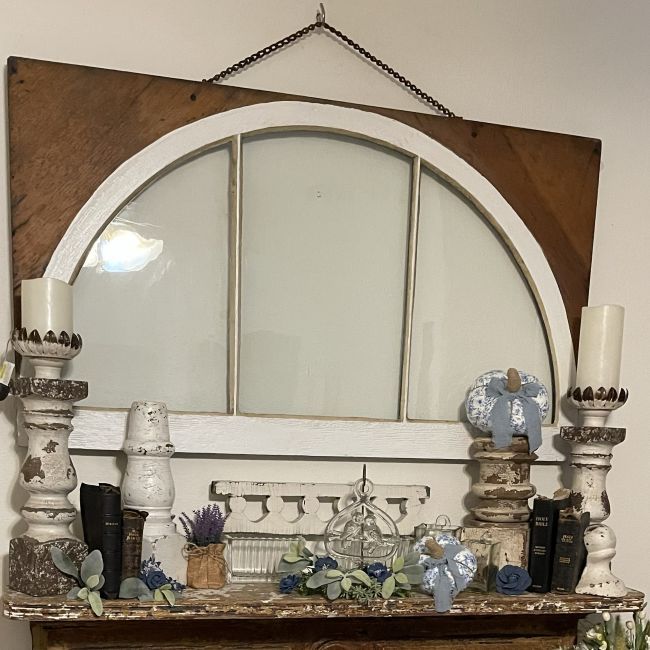 architectural salvage pieces accent an early fall mantel with blue & white pumpkins